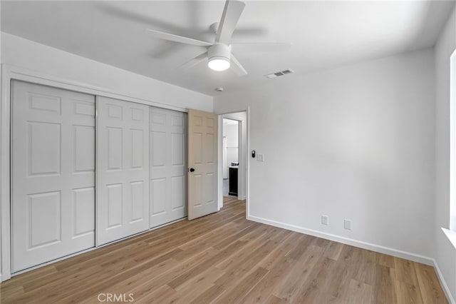 1534 Princeton Ave, Madera, CA 93637 - unfurnished bedroom with light wood-style flooring, a closet, and ceiling fan