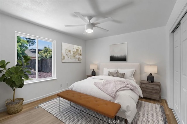 1534 Princeton Ave, Madera, CA 93637 - bedroom with a closet, light wood finished floors, and a ceiling fan