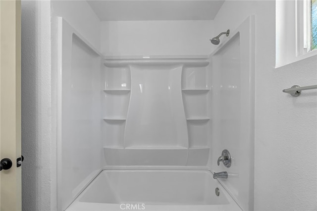 1534 Princeton Ave, Madera, CA 93637 - full bath featuring bathtub / shower combination and a textured wall