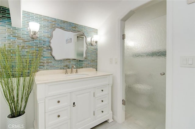 17072 5th St Unit A, Sunset Beach, CA 90742 - full bath featuring vanity, a stall shower, tasteful backsplash, and tile patterned flooring
