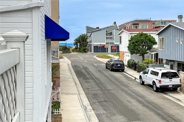 17072 5th St Unit A, Sunset Beach, CA 90742 - view of asphalt street featuring traffic signs, curbs, and sidewalks