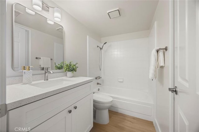 2260 Ardemore Dr, Fullerton, CA 92833 - full bath with vanity, wood finished floors, and washtub / shower combination