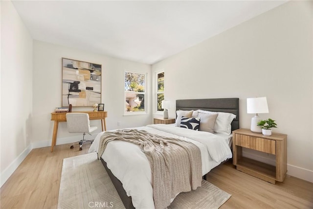 2260 Ardemore Dr, Fullerton, CA 92833 - bedroom with light wood finished floors and a desk