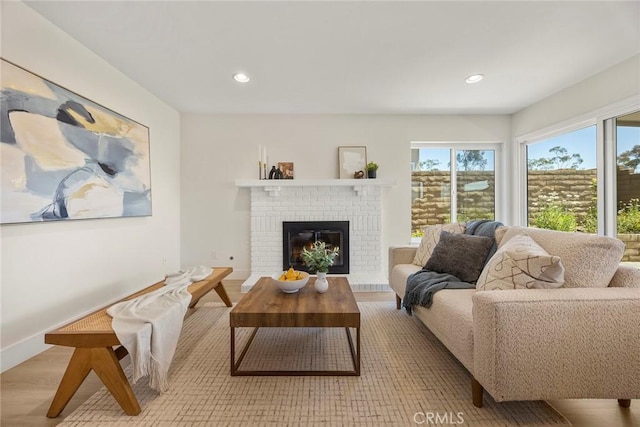 2260 Ardemore Dr, Fullerton, CA 92833 - living room with a fireplace, wood finished floors, and recessed lighting