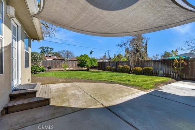 404 W Robinson Ave, Fresno, CA 93705 - fenced backyard featuring a patio area