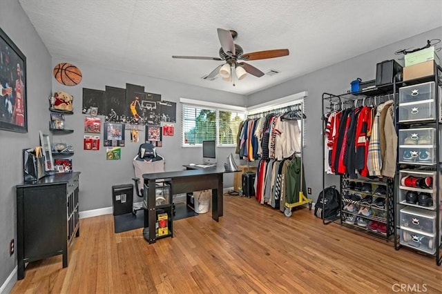 404 W Robinson Ave, Fresno, CA 93705 - office with a ceiling fan, wood finished floors, and a textured ceiling