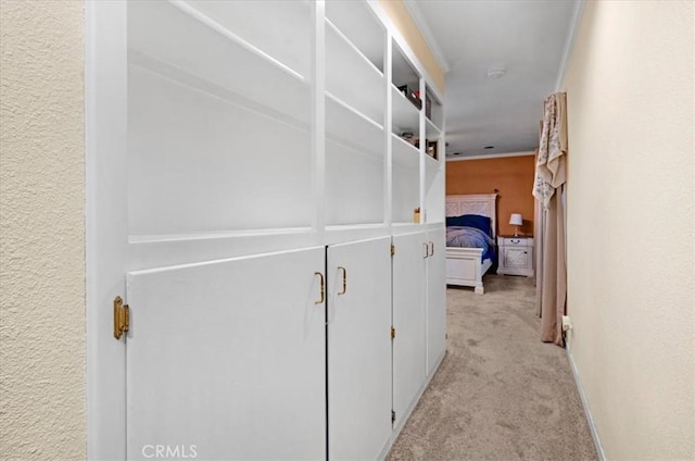 404 W Robinson Ave, Fresno, CA 93705 - corridor with light colored carpet and crown molding
