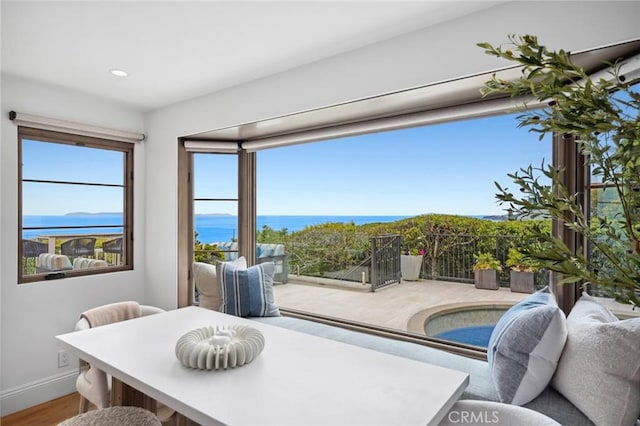 2570 Queda Way, Laguna Beach, CA 92651 - dining space with a water view, wood finished floors, and recessed lighting