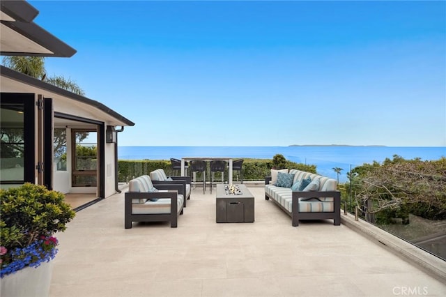 2570 Queda Way, Laguna Beach, CA 92651 - view of patio / terrace featuring an outdoor living space with a fire pit and a water view
