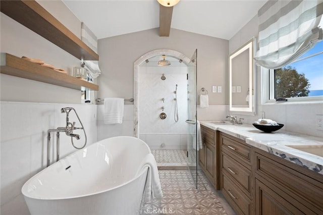 2570 Queda Way, Laguna Beach, CA 92651 - full bathroom with a shower stall, a freestanding bath, double vanity, and tile patterned flooring