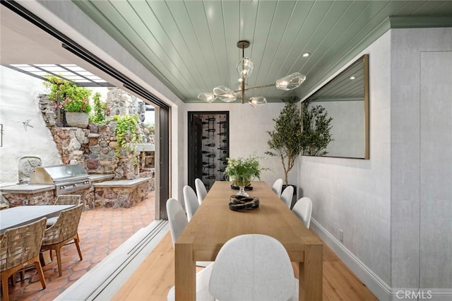 2570 Queda Way, Laguna Beach, CA 92651 - dining room with a chandelier and wood finished floors