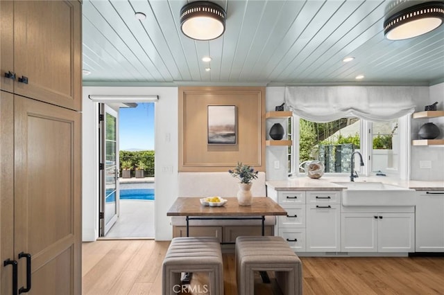 2570 Queda Way, Laguna Beach, CA 92651 - dining area with light wood finished floors, wood ceiling, recessed lighting, and crown molding