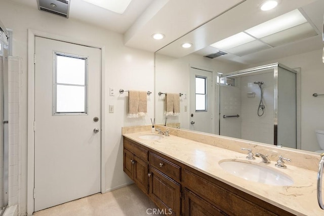 2443 Windward Ln, Newport Beach, CA 92660 - full bathroom with a shower stall, double vanity, and recessed lighting