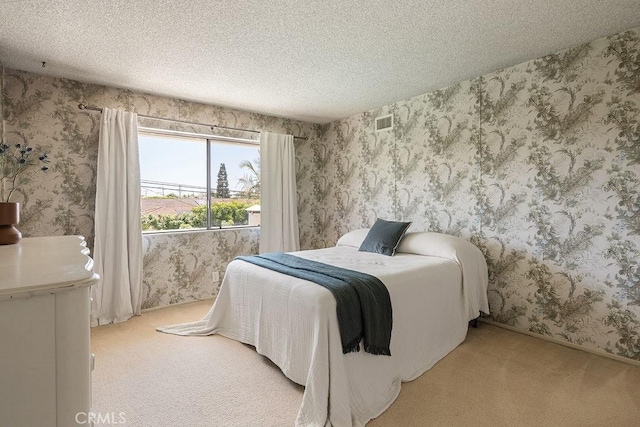 2443 Windward Ln, Newport Beach, CA 92660 - bedroom featuring light colored carpet, a textured ceiling, and wallpapered walls