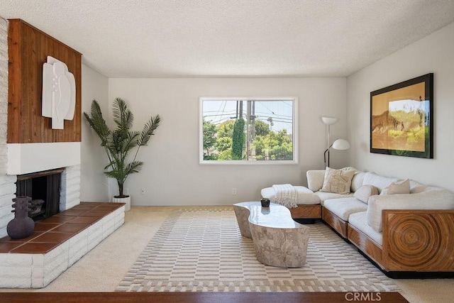 2443 Windward Ln, Newport Beach, CA 92660 - living area with carpet flooring, a fireplace, and a textured ceiling
