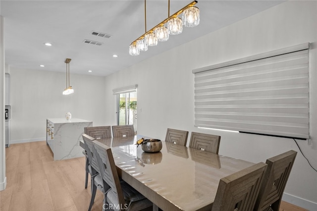 18340 Keswick St Unit 5, Reseda, CA 91335 - dining room featuring light wood-style floors and recessed lighting