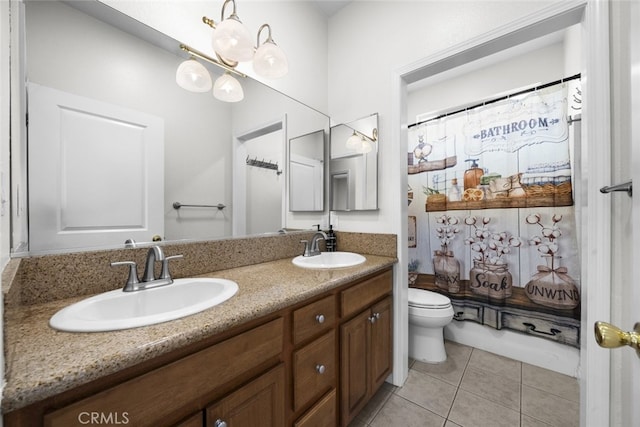 18340 Keswick St Unit 5, Reseda, CA 91335 - bathroom with double vanity, tile patterned floors, and curtained shower