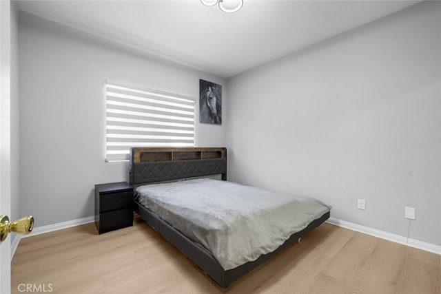 18340 Keswick St Unit 5, Reseda, CA 91335 - bedroom with wood finished floors and baseboards