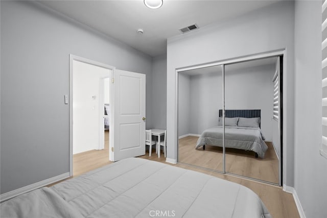 18340 Keswick St Unit 5, Reseda, CA 91335 - bedroom with wood finished floors and a closet