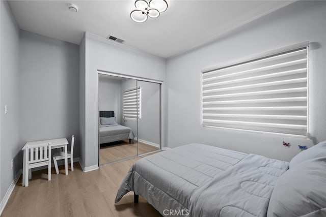 18340 Keswick St Unit 5, Reseda, CA 91335 - bedroom featuring wood finished floors and a closet