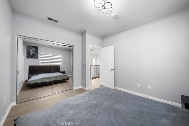 18340 Keswick St Unit 5, Reseda, CA 91335 - bedroom featuring wood finished floors and a closet