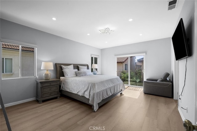 18340 Keswick St Unit 5, Reseda, CA 91335 - bedroom with access to outside, light wood-style flooring, and recessed lighting