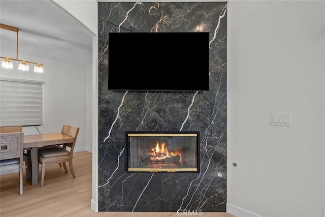 18340 Keswick St Unit 5, Reseda, CA 91335 - detailed view of wood finished floors and a fireplace