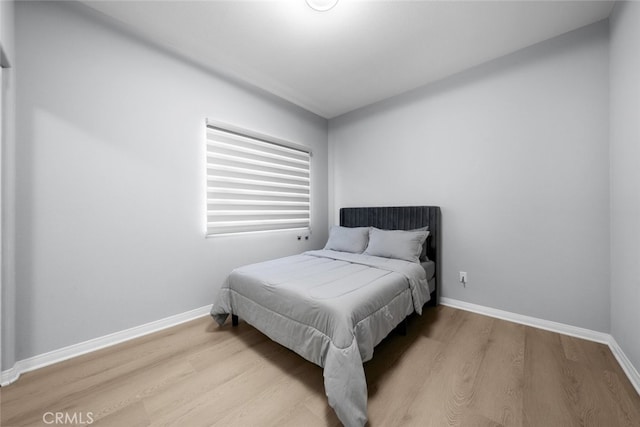 18340 Keswick St Unit 5, Reseda, CA 91335 - bedroom with wood finished floors and baseboards