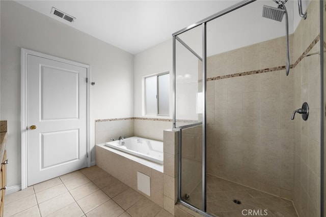 18340 Keswick St Unit 5, Reseda, CA 91335 - full bathroom with a stall shower, a whirlpool tub, and tile patterned floors