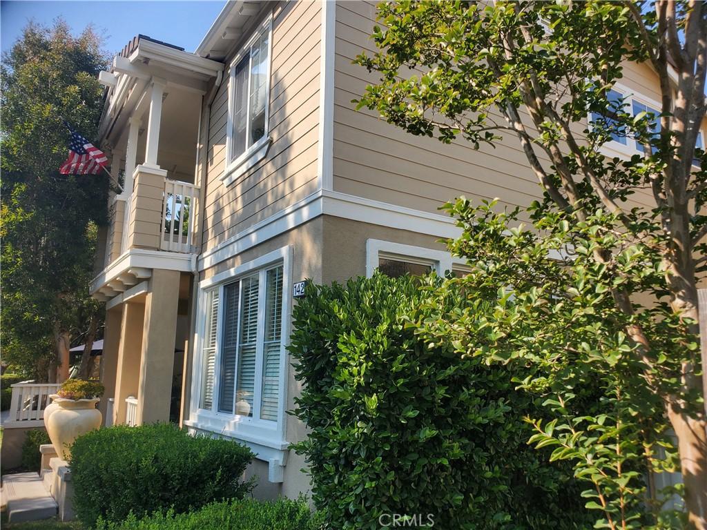 142 Main St, Ladera Ranch, CA 92694 - view of side of property with a balcony and stucco siding
