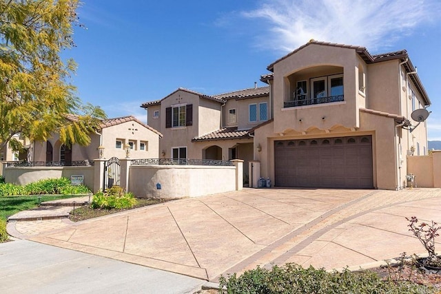 2856 Falling Waters Ct, Chula Vista, CA 91915 - mediterranean / spanish house with a gate, concrete driveway, a fenced front yard, stucco siding, and a garage