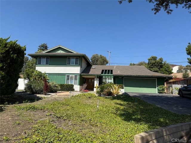 152 Ventana Ct, Thousand Oaks, CA 91360 - view of front of house featuring stucco siding, a garage, driveway, and a front lawn