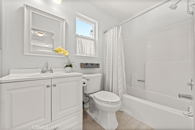 1336 Granada St, Upland, CA 91784 - bathroom featuring vanity, shower / bath combo with shower curtain, and wood finished floors