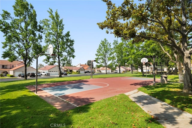 1336 Granada St, Upland, CA 91784 - view of basketball court featuring a residential view, a lawn, and community basketball court