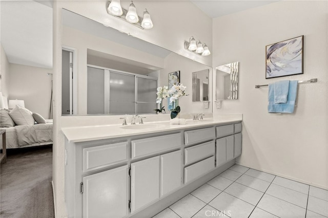 1336 Granada St, Upland, CA 91784 - full bath featuring double vanity, a shower stall, connected bathroom, and tile patterned flooring