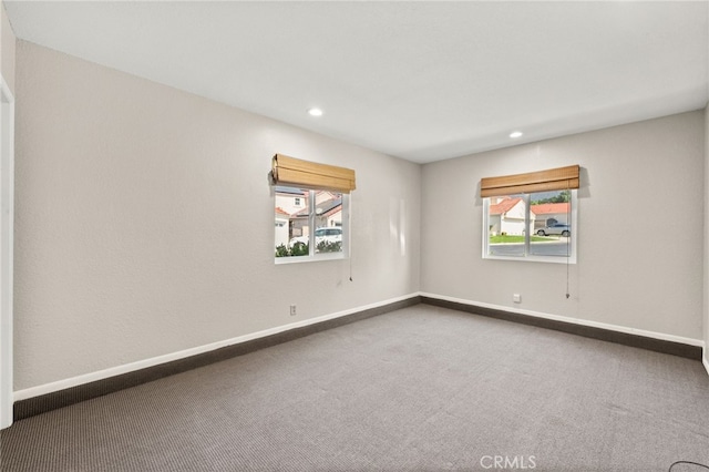 1336 Granada St, Upland, CA 91784 - carpeted empty room with healthy amount of natural light and recessed lighting