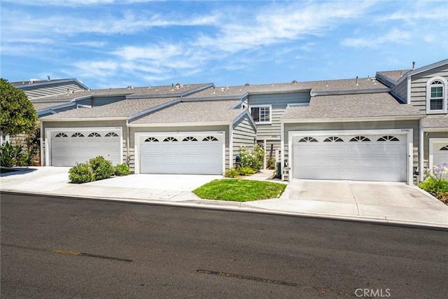 33144 Ocean Rdg, Dana Point, CA 92629 - ranch-style house with concrete driveway, a garage, and roof with shingles