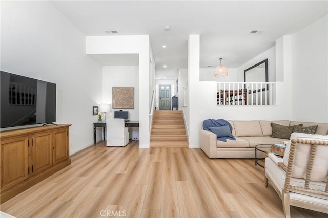 33144 Ocean Rdg, Dana Point, CA 92629 - living room with light wood finished floors, recessed lighting, and stairway