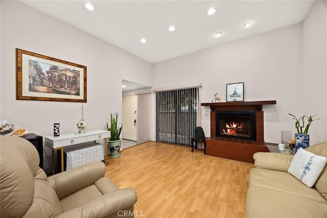 513 N Chandler Ave Unit E, Monterey Park, CA 91754 - living room featuring light wood-style floors, recessed lighting, and a fireplace
