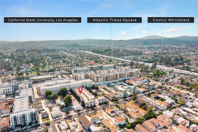 513 N Chandler Ave Unit E, Monterey Park, CA 91754 - aerial overview of property's location with a mountain backdrop and nearby urban area