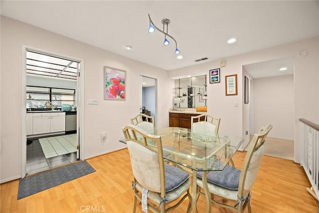 513 N Chandler Ave Unit E, Monterey Park, CA 91754 - dining room with light wood-style floors and recessed lighting