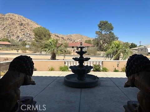 17134 Joshua Rd, Apple Valley, CA 92307 - view of patio with a mountain view