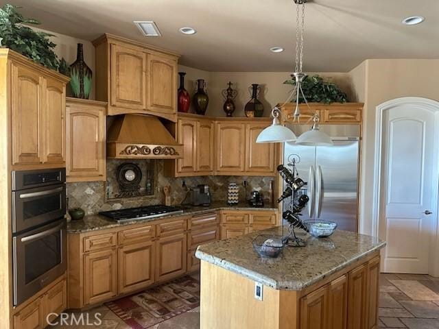 17134 Joshua Rd, Apple Valley, CA 92307 - kitchen featuring appliances with stainless steel finishes, light stone counters, backsplash, custom exhaust hood, and recessed lighting