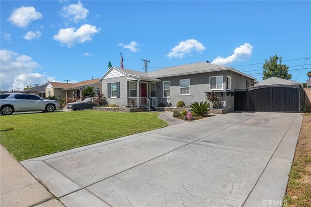 10625 Rose Dr, Whittier, CA 90606 - single story home featuring stucco siding, a gate, a front lawn, and concrete driveway