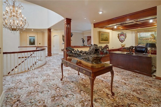 rec room featuring a notable chandelier, light carpet, crown molding, and ornate columns