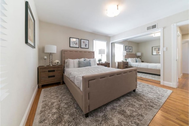 bedroom featuring hardwood / wood-style flooring