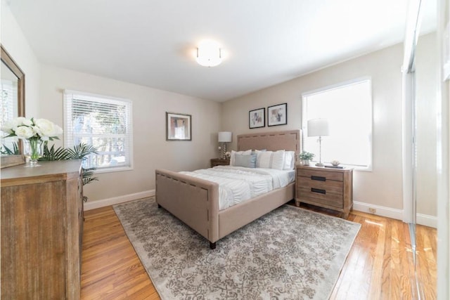 bedroom with light hardwood / wood-style flooring