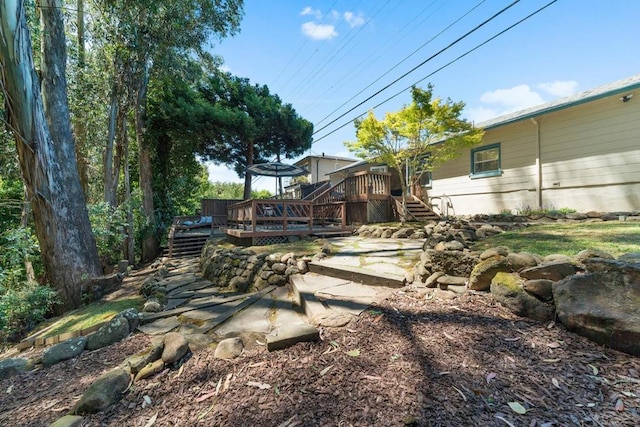 view of yard with a deck