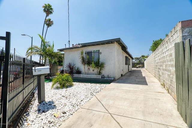 view of home's exterior with a patio