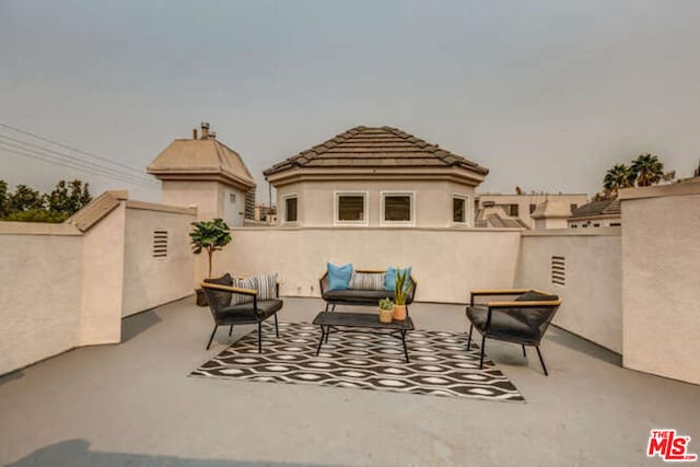 view of patio / terrace with an outdoor hangout area